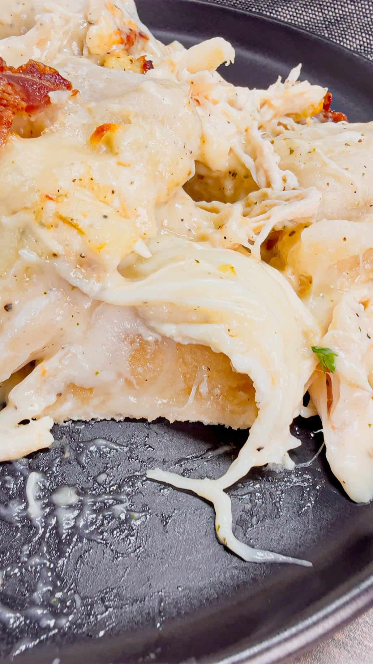 Chicken Alfredo Pierogi Casserole is an easy but hearty dinner recipe that combines two beloved classic foods into one dish. This creamy casserole is loaded with shredded rotisserie chicken, alfredo sauce, pierogies, mozzarella cheese and chopped bacon.