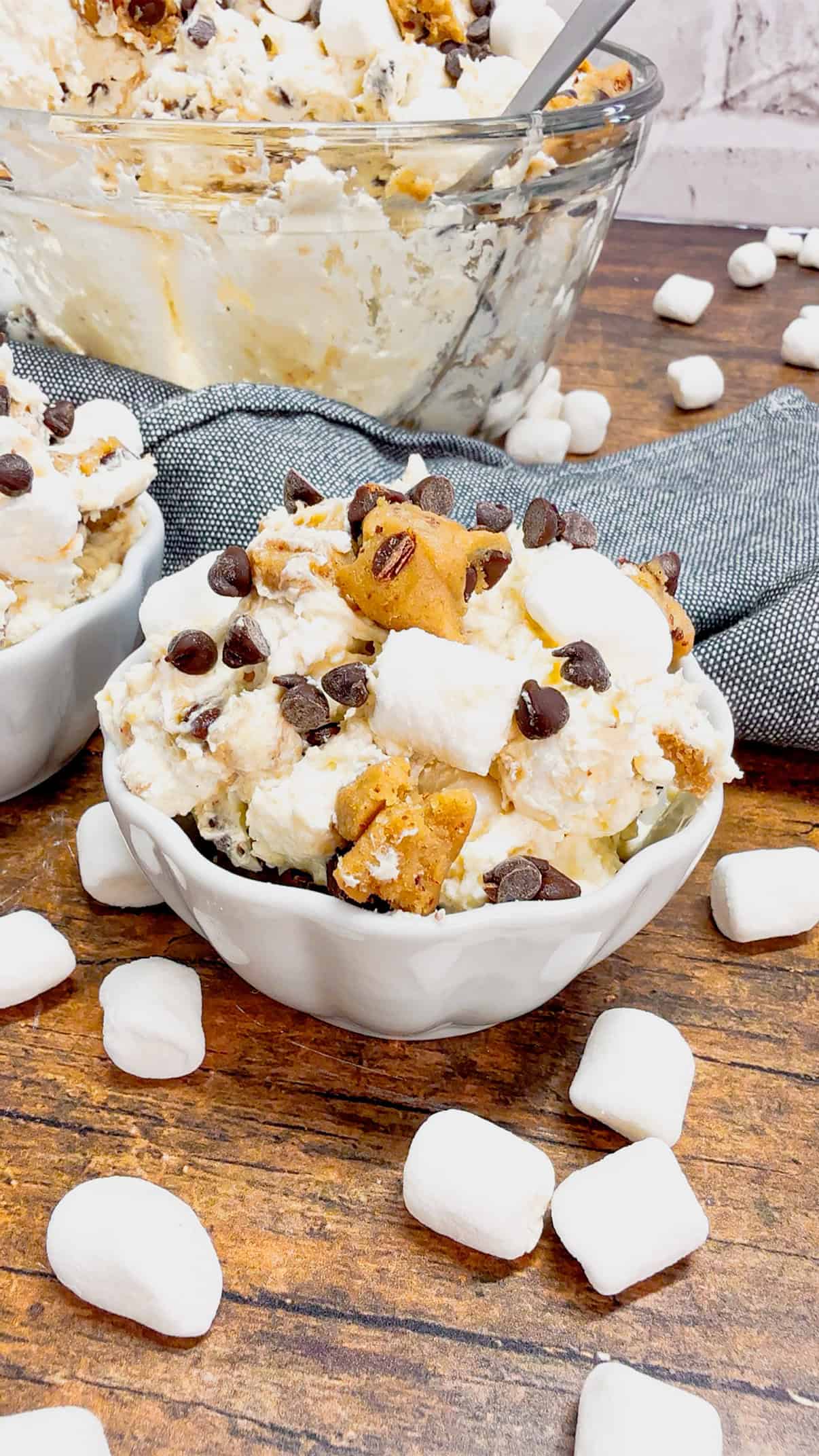 Cookie Dough Fluff is a quick and easy no bake dessert recipe perfect for summer. This rich and creamy dessert is loaded with cream cheese, Cool Whip, instant vanilla pudding, mini marshmallows, chunks of Pillsbury chocolate chip cookie dough and mini chocolate chips.