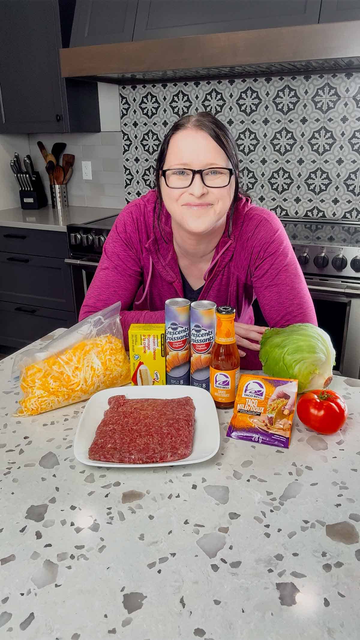 taco pizza ingredients on the kitchen counter