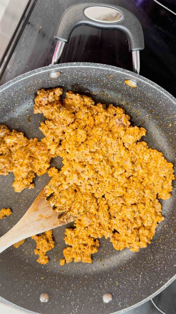 cream cheese and ground beef taco mixture in a skillet