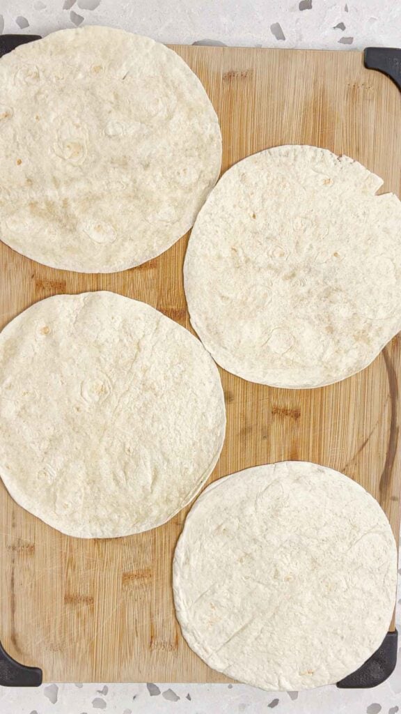 flour tortillas on a cutting board
