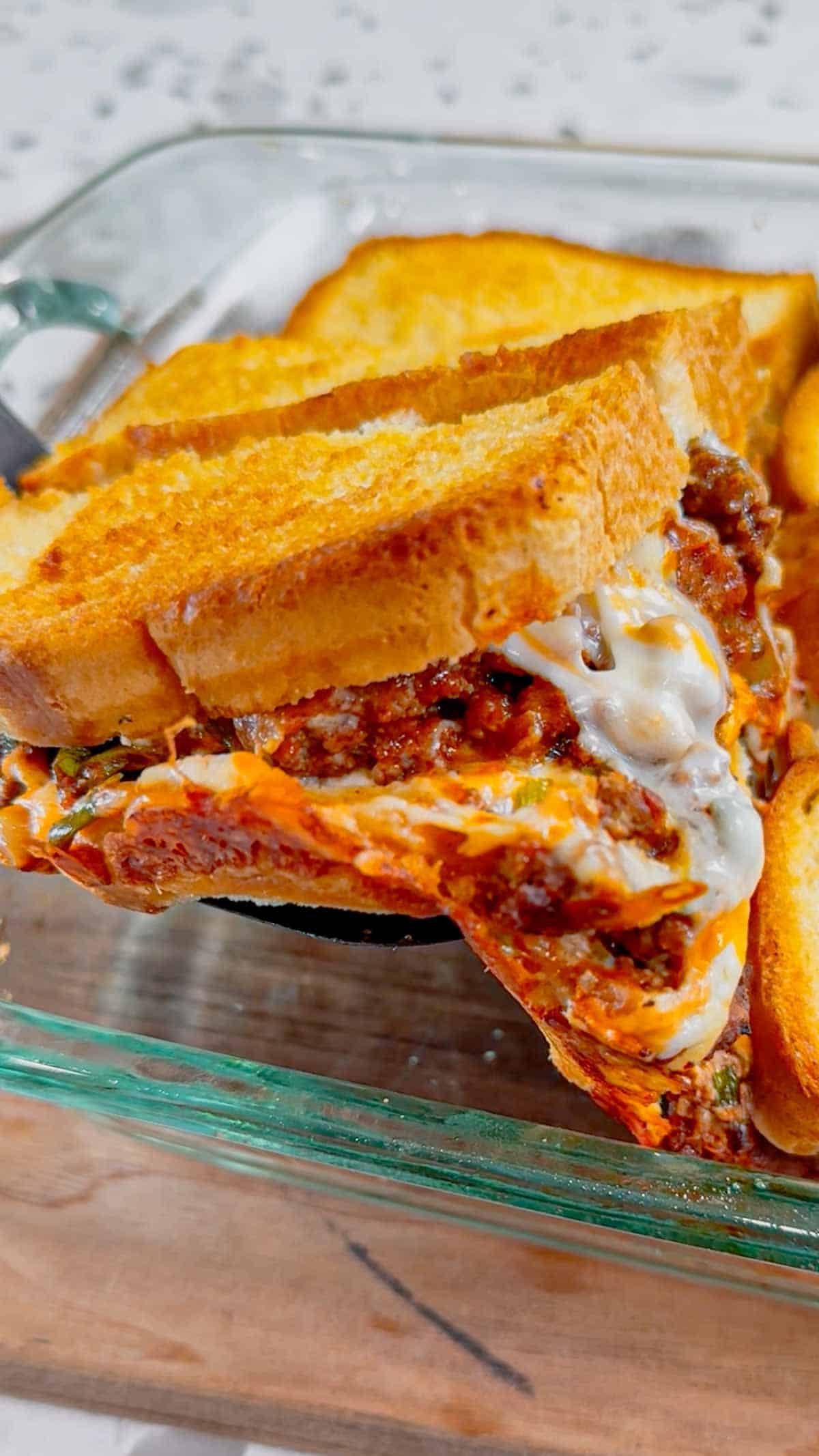 Beef Taco Grilled Cheese Casserole is an easy casserole recipe with layers of toasted bread, cheese and ground beef tossed in salsa, chili sauce and taco seasoning.
