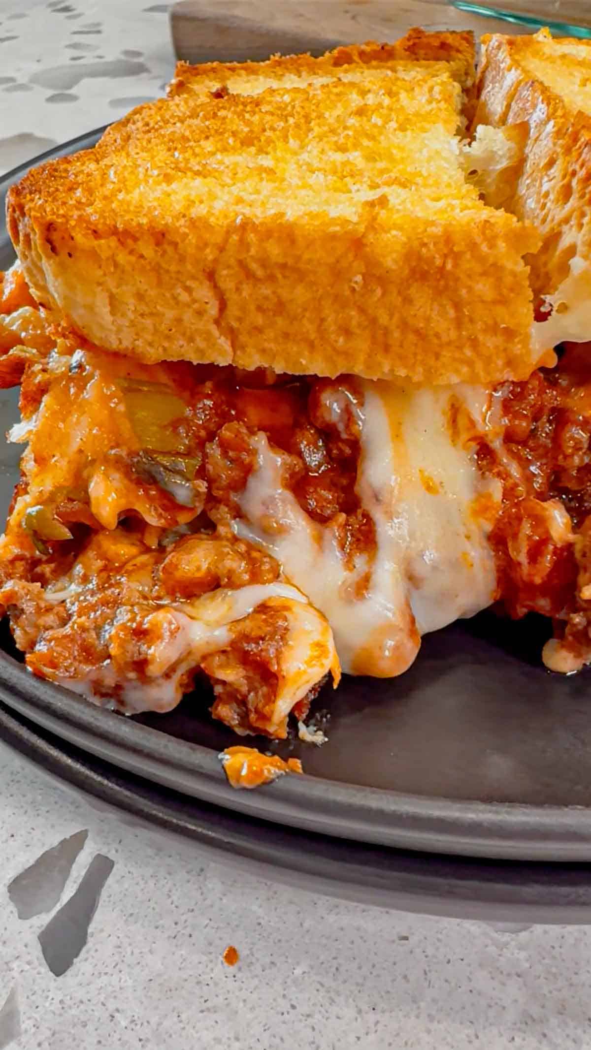 Beef Taco Grilled Cheese Casserole is an easy casserole recipe with layers of toasted bread, cheese and ground beef tossed in salsa, chili sauce and taco seasoning.