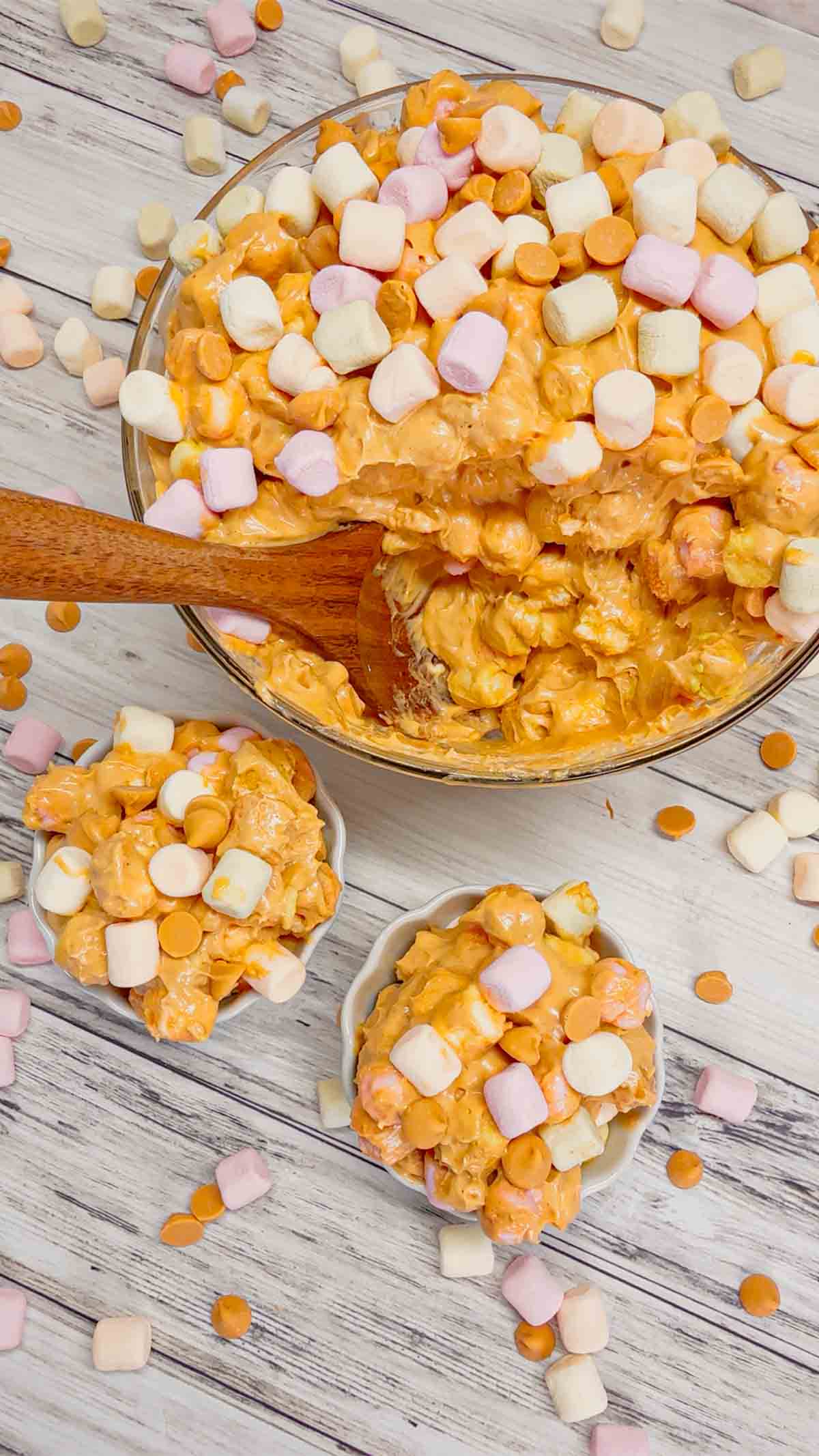 Peanut Butter Butterscotch Confetti Fluff is an easy no bake dessert recipe perfect for potlucks and gatherings. This tasty dessert made with butterscotch pudding, cream cheese, peanut butter, Cool Whip, butterscotch chips and colourful mini marshmallows is inspired by the classic peanut butter butterscotch marshmallow squares we all love.