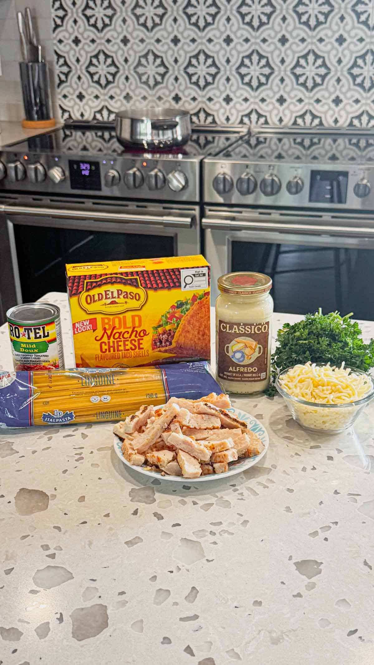 chicken alfredo tacos ingredients on the kitchen counter