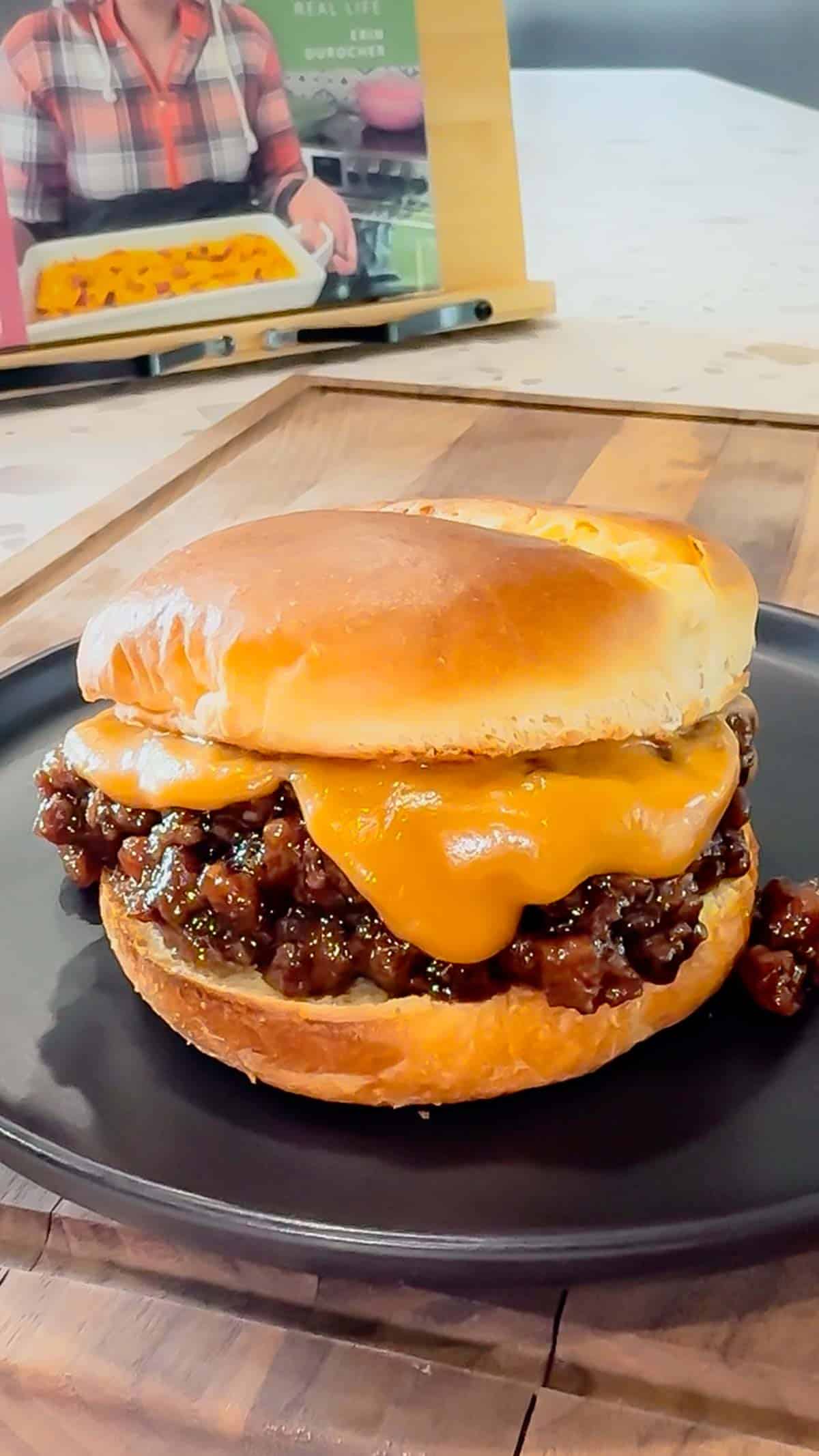 Peanut Butter and Jelly Sloppy Joes are a fun twist on a classic family dinner recipe. These tasty sandwiches are loaded with ground beef tossed in a strawberry jam and bbq sauce mixture and topped with a coconut milk peanut butter sauce with a bit of a kick from some Thai sweet chili sauce.