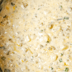 Cheesy Hamburger Potato Soup is the perfect cold weather comfort food for fall and winter. This thick and creamy soup is loaded with ground beef, diced potatoes, green onions and cheddar cheese. If you are looking for an easy weeknight dinner recipe idea using ground beef then you need to give this a try. It is a family friendly meal kids will love.