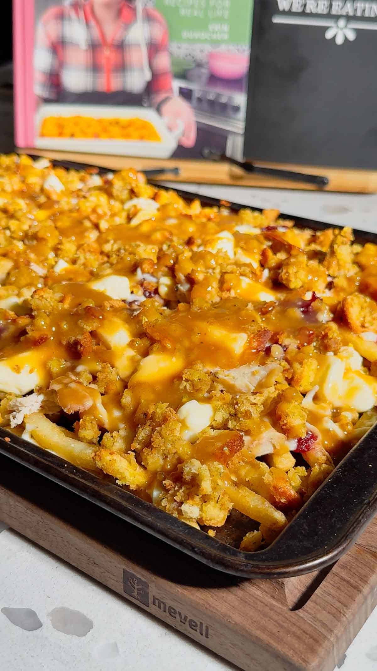 Turn your Thanksgiving leftovers into the ultimate comfort food with this Sheet Pan Thanksgiving Poutine! Crispy french fries loaded with shredded turkey, cheese curds, mozzarella, stuffing, cranberry sauce, and plenty of rich gravy. It’s easy, melty, over-the-top delicious, and the perfect way to reinvent holiday leftovers. Save this recipe for your post-Thanksgiving cravings!