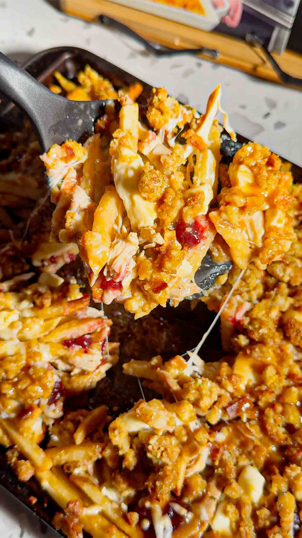 Turn your Thanksgiving leftovers into the ultimate comfort food with this Sheet Pan Thanksgiving Poutine! Crispy french fries loaded with shredded turkey, cheese curds, mozzarella, stuffing, cranberry sauce, and plenty of rich gravy. It’s easy, melty, over-the-top delicious, and the perfect way to reinvent holiday leftovers. Save this recipe for your post-Thanksgiving cravings!