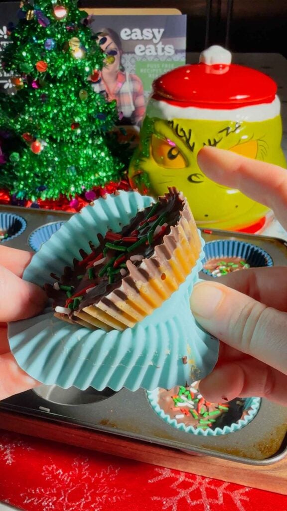 Get ready for the ultimate sweet-and-salty holiday treat with these Peanut Butter Ritz Crack Christmas Crack Cookies! Made in muffin tins, this fun twist on classic Christmas crack uses Peanut Butter Ritz Cracker Snackwiches smothered in rich, buttery toffee, topped with melted semi-sweet chocolate, and finished with festive sprinkles. Easy to make, irresistibly crunchy, and perfectly portioned, these holiday cookies are guaranteed to disappear fast at parties, on cookie trays, or as edible gifts.