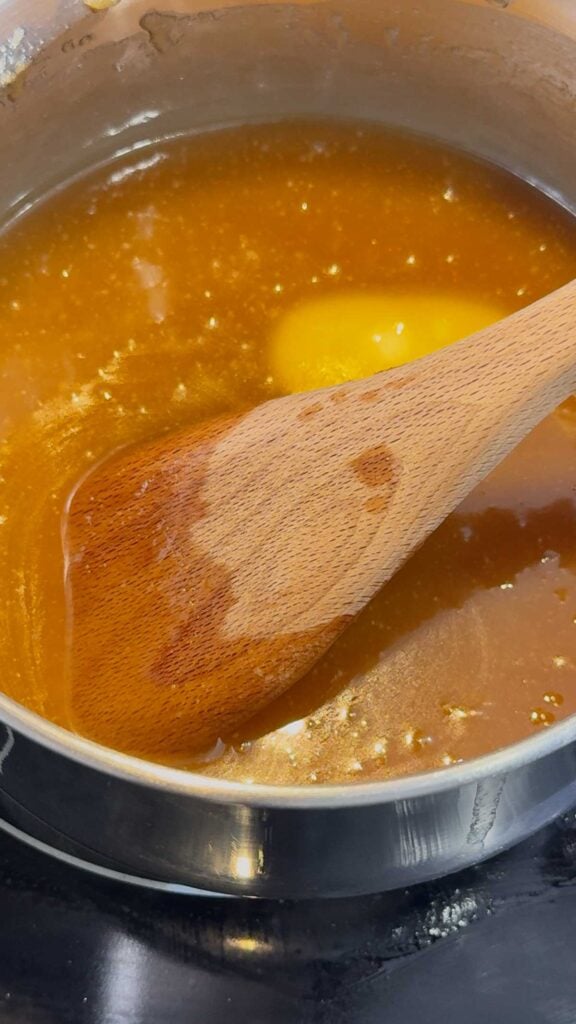 butter and brown sugar melting in a saucepan