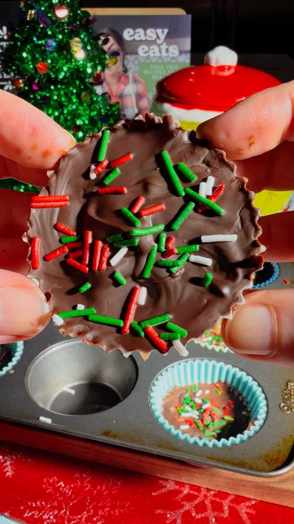 Get ready for the ultimate sweet-and-salty holiday treat with these Peanut Butter Ritz Crack Christmas Crack Cookies! Made in muffin tins, this fun twist on classic Christmas crack uses Peanut Butter Ritz Cracker Snackwiches smothered in rich, buttery toffee, topped with melted semi-sweet chocolate, and finished with festive sprinkles. Easy to make, irresistibly crunchy, and perfectly portioned, these holiday cookies are guaranteed to disappear fast at parties, on cookie trays, or as edible gifts.