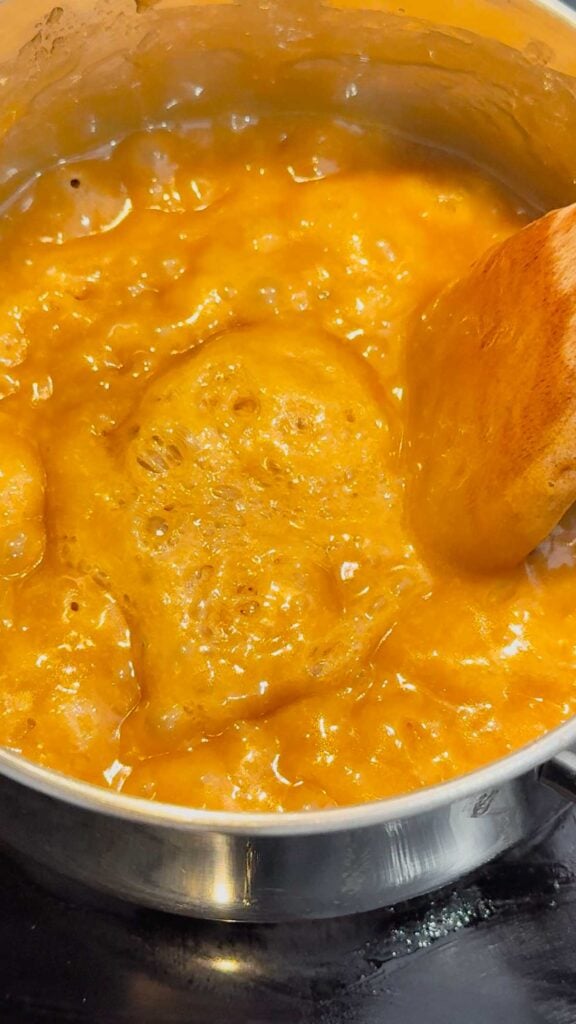 bubbling brown sugar and butter mixture in a saucepan