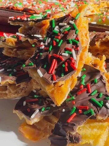 This Potato Chip Christmas Crack is the ultimate sweet-and-salty holiday treat that disappears fast. Made with crispy potato chips, homemade buttery toffee, melted chocolate, and topped with festive sprinkles, this easy no-bake Christmas crack recipe is perfect for holiday parties, cookie trays, and edible gifts.