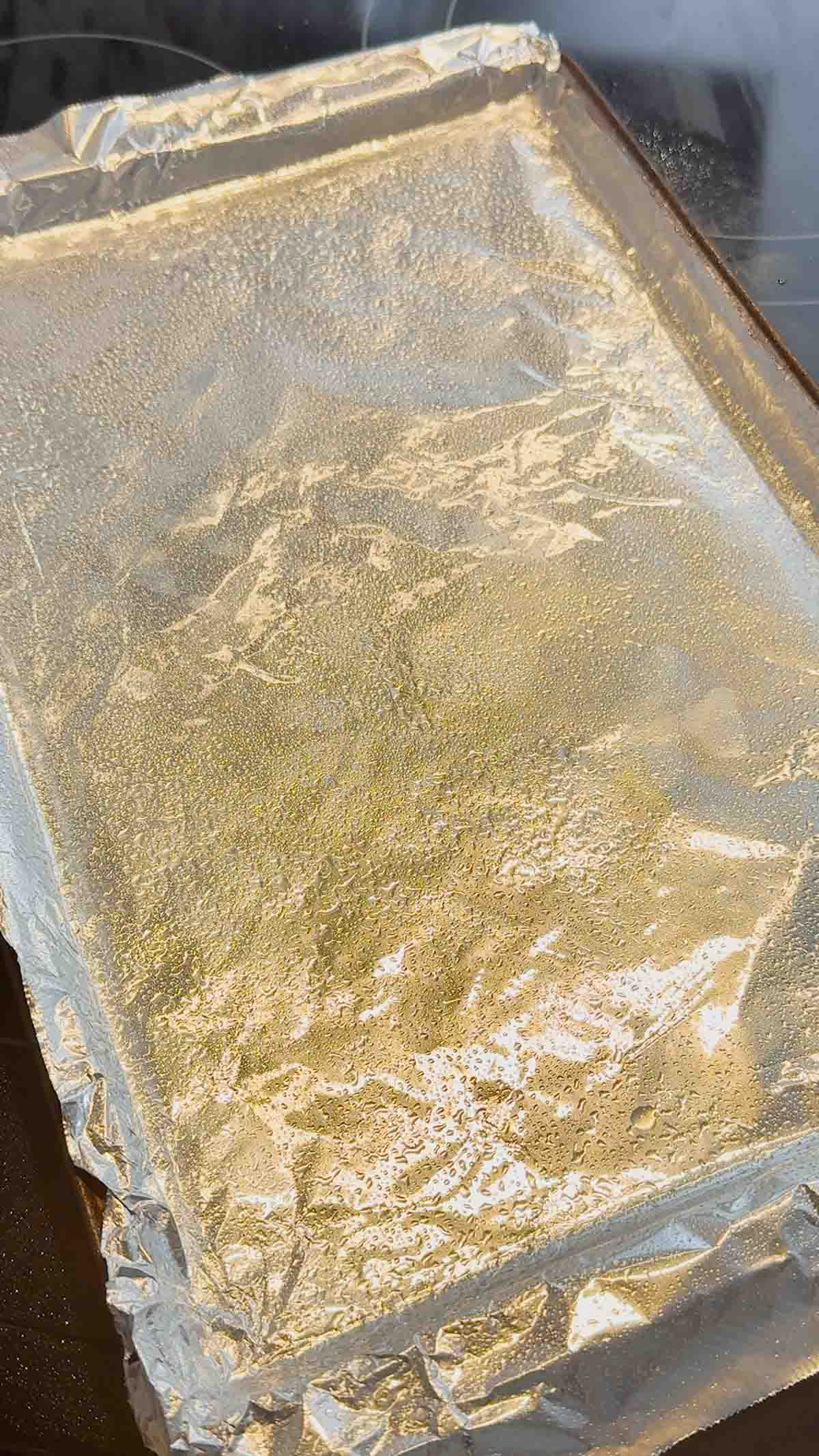 foil lined baking sheet sprayed with cooking spray