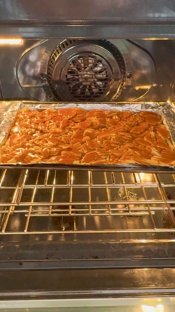 potato chips coated in toffee baking in the oven