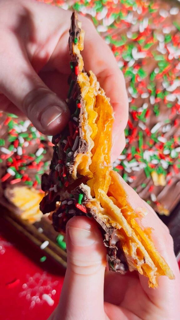 This Potato Chip Christmas Crack is the ultimate sweet-and-salty holiday treat that disappears fast. Made with crispy potato chips, homemade buttery toffee, melted chocolate, and topped with festive sprinkles, this easy no-bake Christmas crack recipe is perfect for holiday parties, cookie trays, and edible gifts.