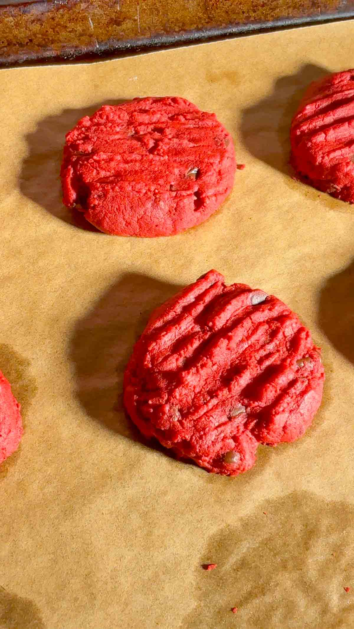 These red velvet shortbread cookies are a festive twist on classic whipped shortbread, with a rich red colour. With cream cheese, a hint of cocoa powder, and mini chocolate chips, this easy red velvet cookie recipe delivers the perfect balance of buttery, chocolatey flavour in every bite. Whether you’re baking for the holidays, a cookie exchange, or just because, these red velvet shortbread cookies are simple to make and guaranteed to stand out on any dessert table.