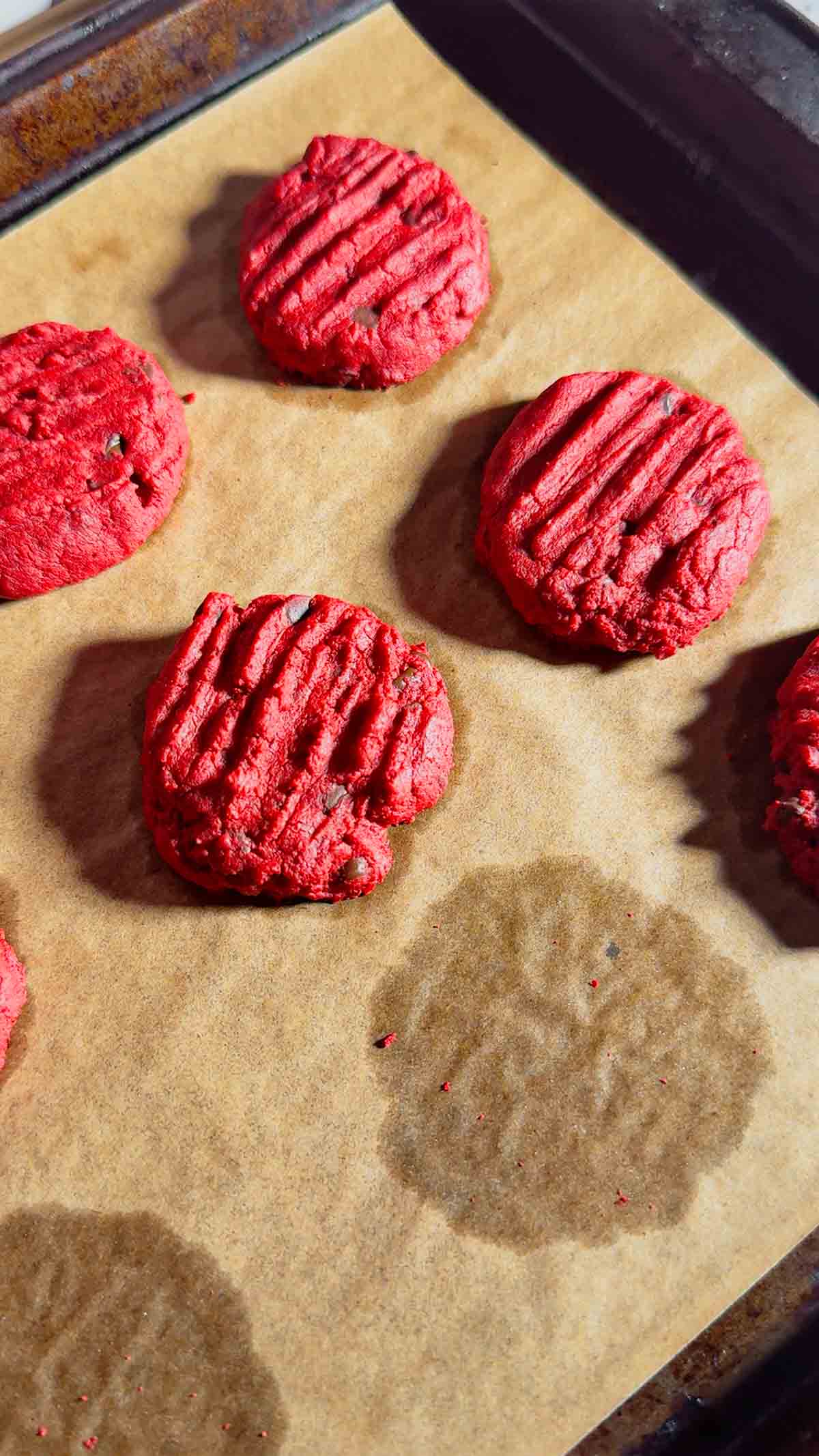 These red velvet shortbread cookies are a festive twist on classic whipped shortbread, with a rich red colour. With cream cheese, a hint of cocoa powder, and mini chocolate chips, this easy red velvet cookie recipe delivers the perfect balance of buttery, chocolatey flavour in every bite. Whether you’re baking for the holidays, a cookie exchange, or just because, these red velvet shortbread cookies are simple to make and guaranteed to stand out on any dessert table.