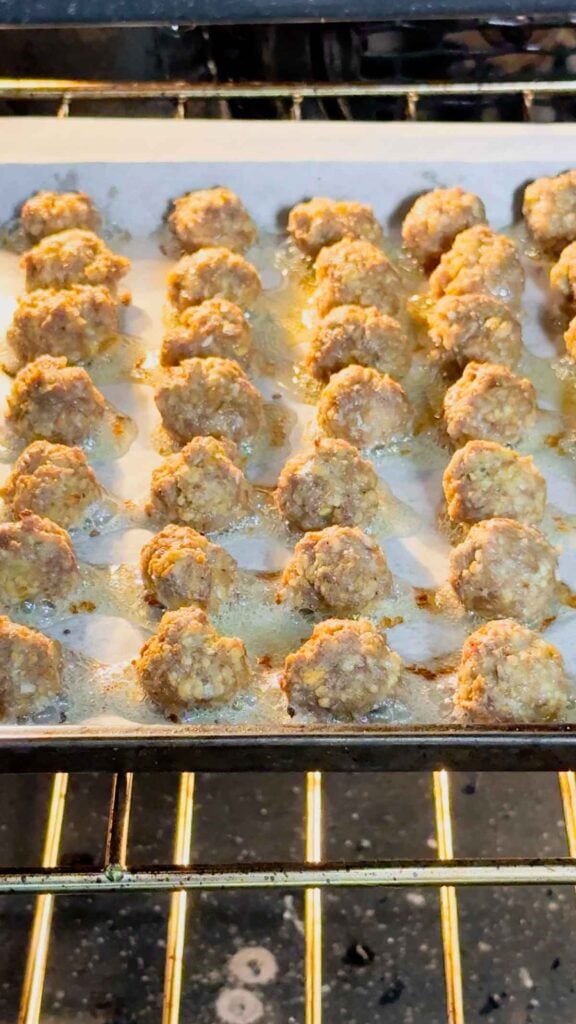 mini meatballs baking in the oven