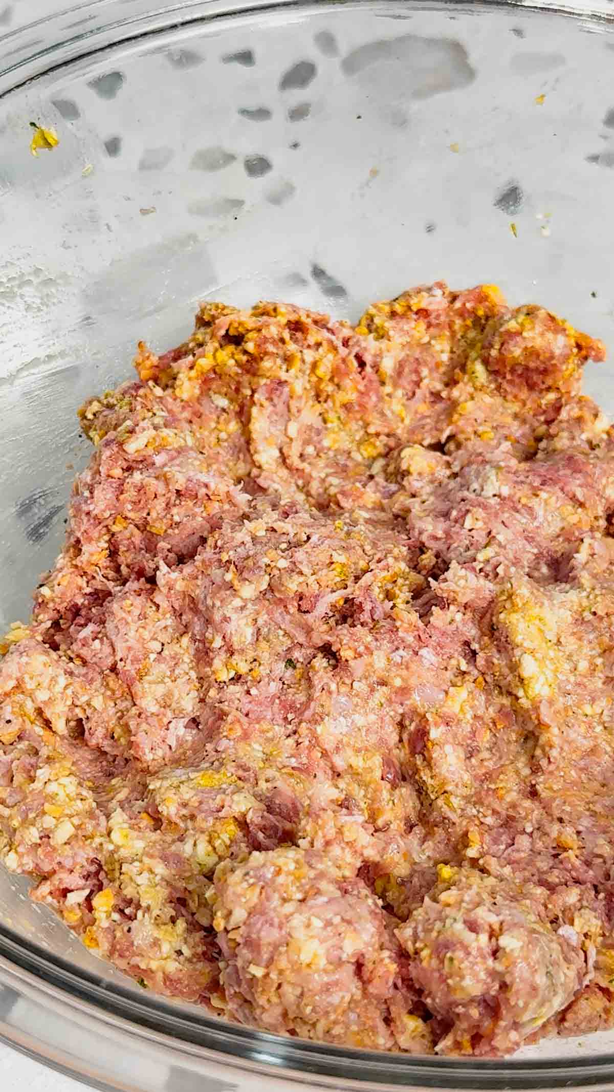 raw meatloaf mixture in a mixing bowl