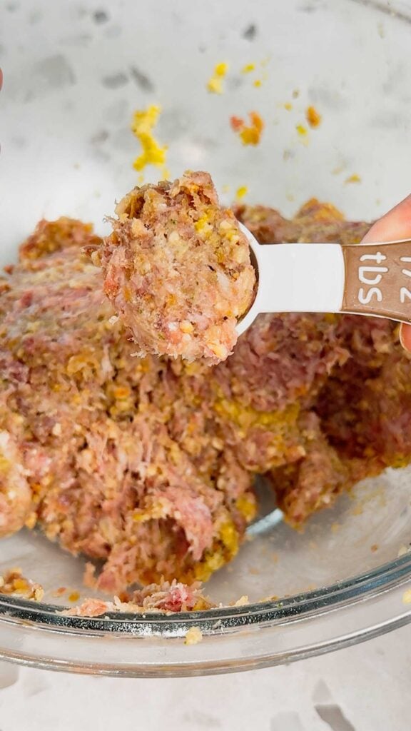 ½ tablespoon scoop of raw meat mixture for meatballs