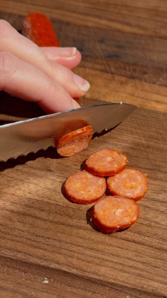 slicing mini pepperonis