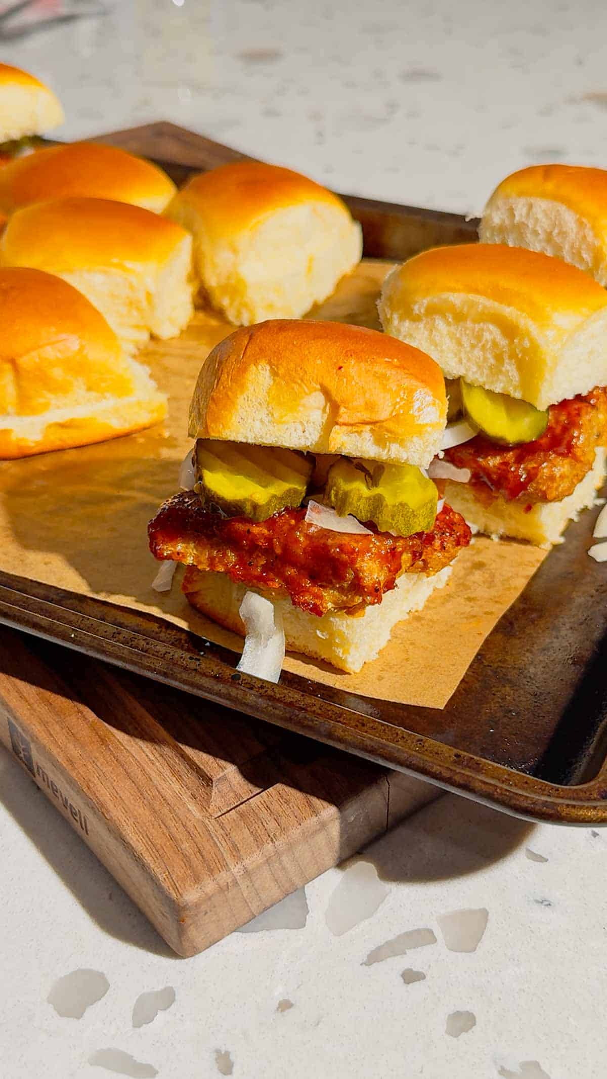 These homemade McRib sliders are the ultimate easy dinner idea for busy weeknights, game day snacks or party food! Made with soft King&rsquo;s Hawaiian rolls brushed with butter and toasted to perfection, these BBQ pork sliders are loaded with juicy ground pork patties seasoned with bold barbecue flavour and coated in Sweet Baby Ray&rsquo;s sauce. Topped with sliced pickles and onions, they deliver that classic McRib taste in a fun, shareable slider recipe. If you&rsquo;re looking for easy slider recipes, Hawaiian roll sliders, BBQ pork recipes or crowd-pleasing comfort food ideas, this simple recipe is a must-try. Perfect for family dinners, picky eaters and quick meals everyone will love!