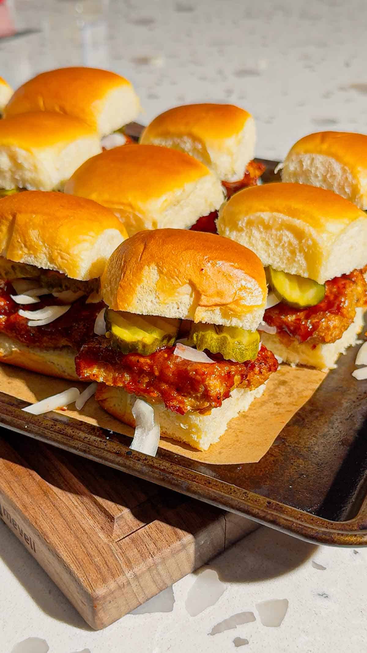 These homemade McRib sliders are the ultimate easy dinner idea for busy weeknights, game day snacks or party food! Made with soft King&rsquo;s Hawaiian rolls brushed with butter and toasted to perfection, these BBQ pork sliders are loaded with juicy ground pork patties seasoned with bold barbecue flavour and coated in Sweet Baby Ray&rsquo;s sauce. Topped with sliced pickles and onions, they deliver that classic McRib taste in a fun, shareable slider recipe. If you&rsquo;re looking for easy slider recipes, Hawaiian roll sliders, BBQ pork recipes or crowd-pleasing comfort food ideas, this simple recipe is a must-try. Perfect for family dinners, picky eaters and quick meals everyone will love!