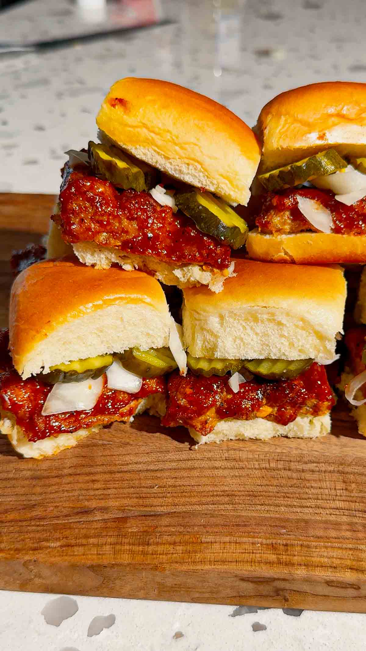 These homemade McRib sliders are the ultimate easy dinner idea for busy weeknights, game day snacks or party food! Made with soft King&rsquo;s Hawaiian rolls brushed with butter and toasted to perfection, these BBQ pork sliders are loaded with juicy ground pork patties seasoned with bold barbecue flavour and coated in Sweet Baby Ray&rsquo;s sauce. Topped with sliced pickles and onions, they deliver that classic McRib taste in a fun, shareable slider recipe. If you&rsquo;re looking for easy slider recipes, Hawaiian roll sliders, BBQ pork recipes or crowd-pleasing comfort food ideas, this simple recipe is a must-try. Perfect for family dinners, picky eaters and quick meals everyone will love!
