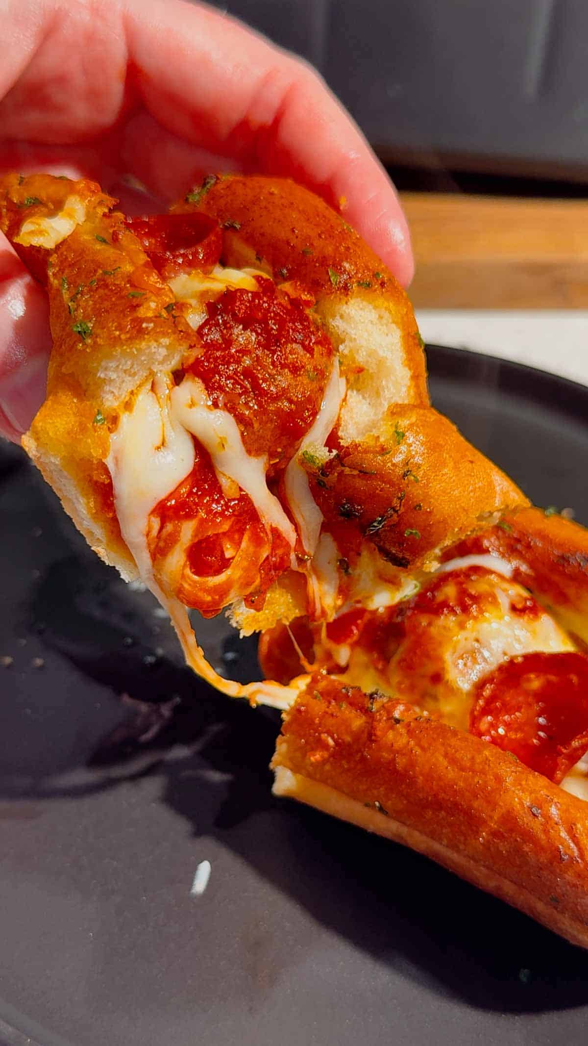 These Air Fryer Pizza Meatball Subs are the ultimate easy comfort food dinner for busy weeknights, game day snacks and picky eaters. Made with frozen meatballs, pizza sauce, pepperoni, mozzarella cheese and buttery toasted hot dog buns, this easy air fryer recipe tastes just like a cheesy pepperoni pizza sub from your favourite restaurant. Perfect for quick family dinners, easy air fryer meals, meatball sandwich recipes, pizza sandwich ideas and kid friendly dinners, these toasted subs come together fast with minimal prep. If you are looking for easy dinner recipes for family, air fryer sandwich recipes, hot sandwich ideas, meatball sub recipes or fun weeknight dinner ideas, these crispy cheesy pizza subs are always a hit.
