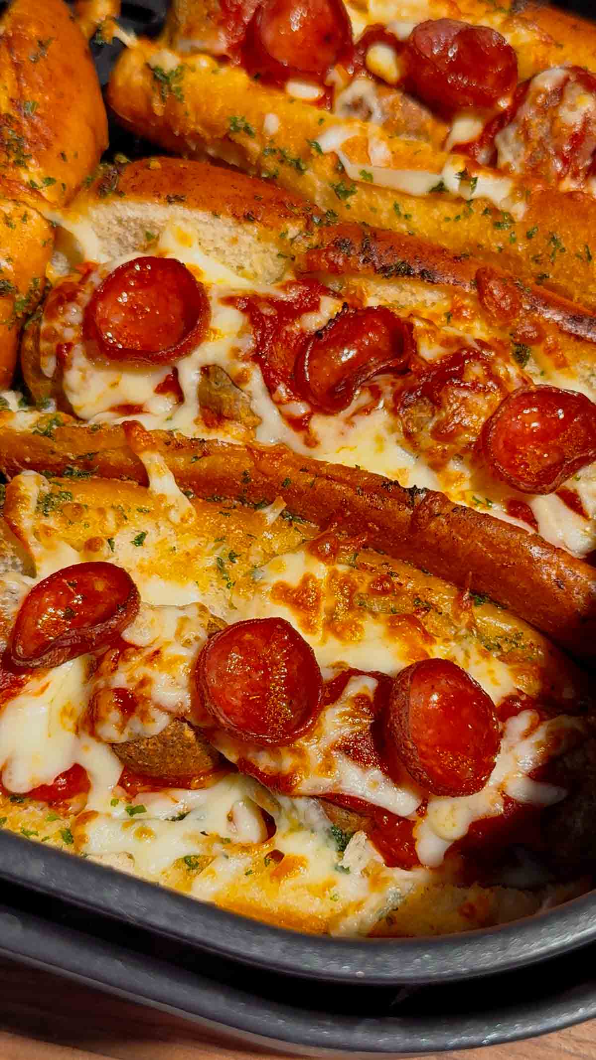 These Air Fryer Pizza Meatball Subs are the ultimate easy comfort food dinner for busy weeknights, game day snacks and picky eaters. Made with frozen meatballs, pizza sauce, pepperoni, mozzarella cheese and buttery toasted hot dog buns, this easy air fryer recipe tastes just like a cheesy pepperoni pizza sub from your favourite restaurant. Perfect for quick family dinners, easy air fryer meals, meatball sandwich recipes, pizza sandwich ideas and kid friendly dinners, these toasted subs come together fast with minimal prep. If you are looking for easy dinner recipes for family, air fryer sandwich recipes, hot sandwich ideas, meatball sub recipes or fun weeknight dinner ideas, these crispy cheesy pizza subs are always a hit.