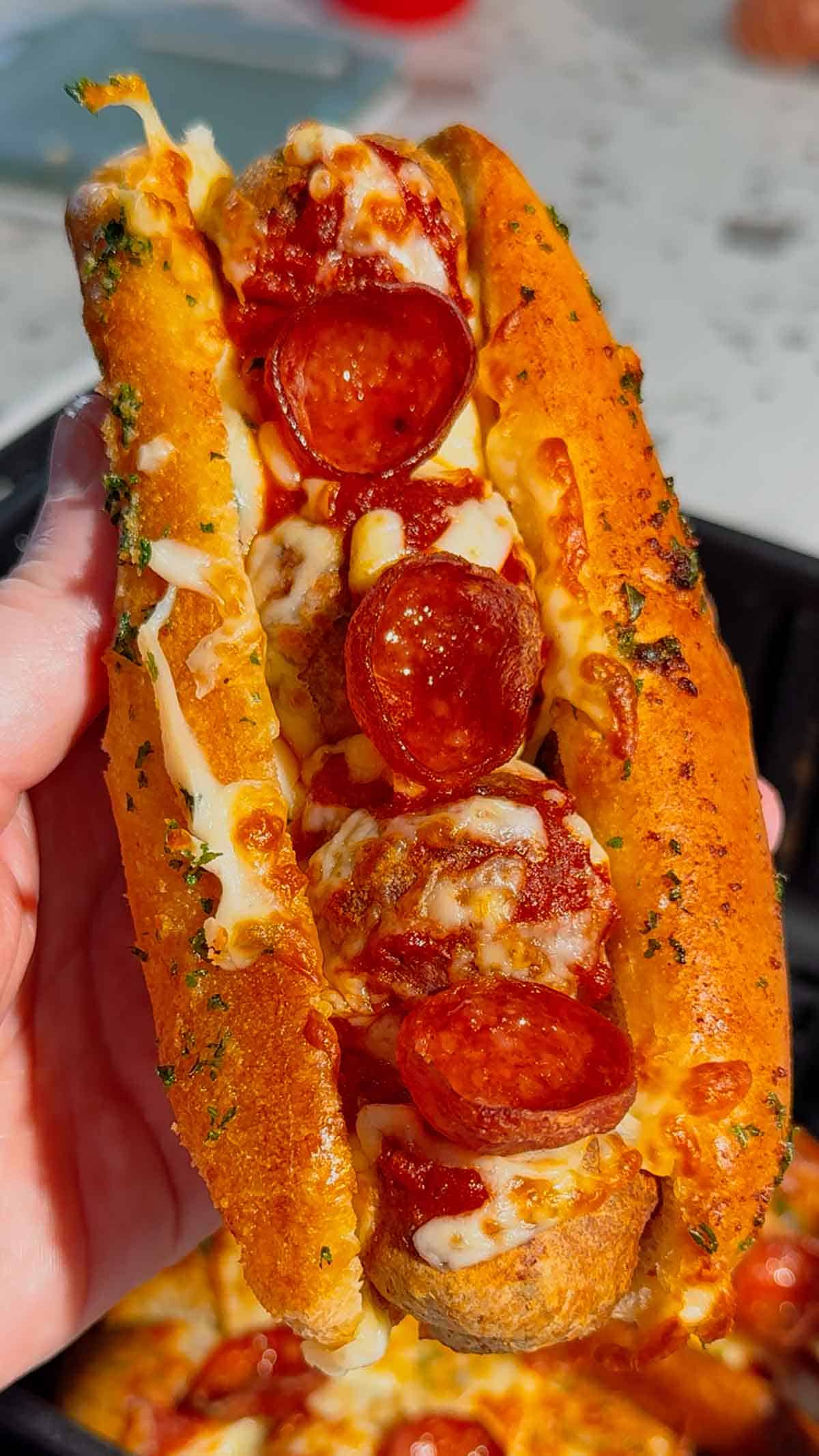 These Air Fryer Pizza Meatball Subs are the ultimate easy comfort food dinner for busy weeknights, game day snacks and picky eaters. Made with frozen meatballs, pizza sauce, pepperoni, mozzarella cheese and buttery toasted hot dog buns, this easy air fryer recipe tastes just like a cheesy pepperoni pizza sub from your favourite restaurant. Perfect for quick family dinners, easy air fryer meals, meatball sandwich recipes, pizza sandwich ideas and kid friendly dinners, these toasted subs come together fast with minimal prep. If you are looking for easy dinner recipes for family, air fryer sandwich recipes, hot sandwich ideas, meatball sub recipes or fun weeknight dinner ideas, these crispy cheesy pizza subs are always a hit.