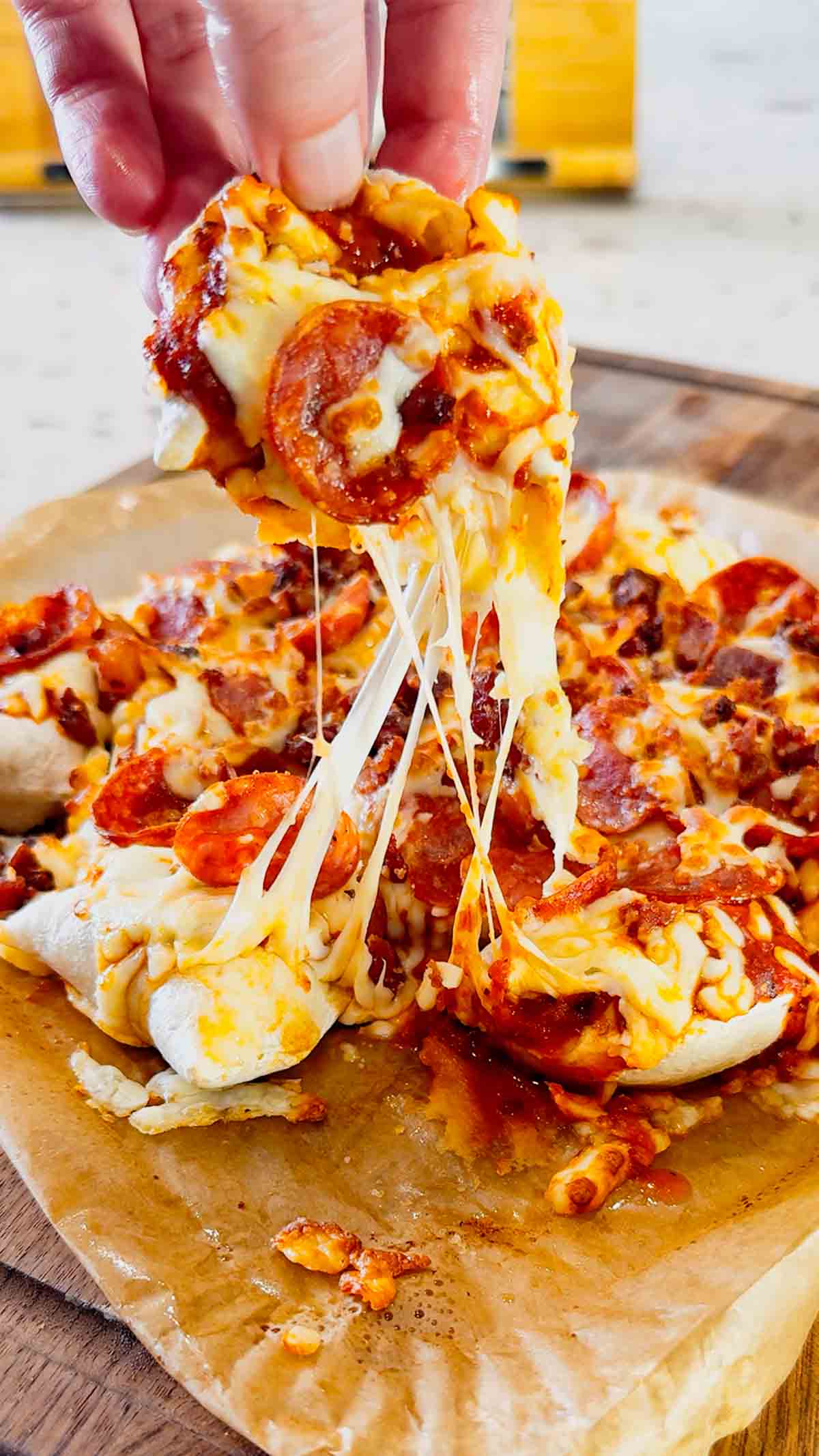 Air Fryer Pizza Pierogies are the ultimate easy comfort food recipe for busy weeknights, game day snacks, party appetizers and lazy dinners. Frozen bacon pierogies are air fried until crispy and golden, then topped with pizza sauce, shredded mozzarella cheese, pepperoni and crumbled bacon for a cheesy pizza-inspired dinner everyone will love. This easy air fryer recipe is perfect for picky eaters, quick meals, easy dinner ideas, air fryer snacks and fun family dinners. If you love pizza recipes, frozen pierogi recipes, cheesy appetizers, easy air fryer dinners, quick comfort food and crispy air fryer recipes, these loaded pizza pierogies are a must-try for your next weeknight meal, movie night snack or game day party food spread.
