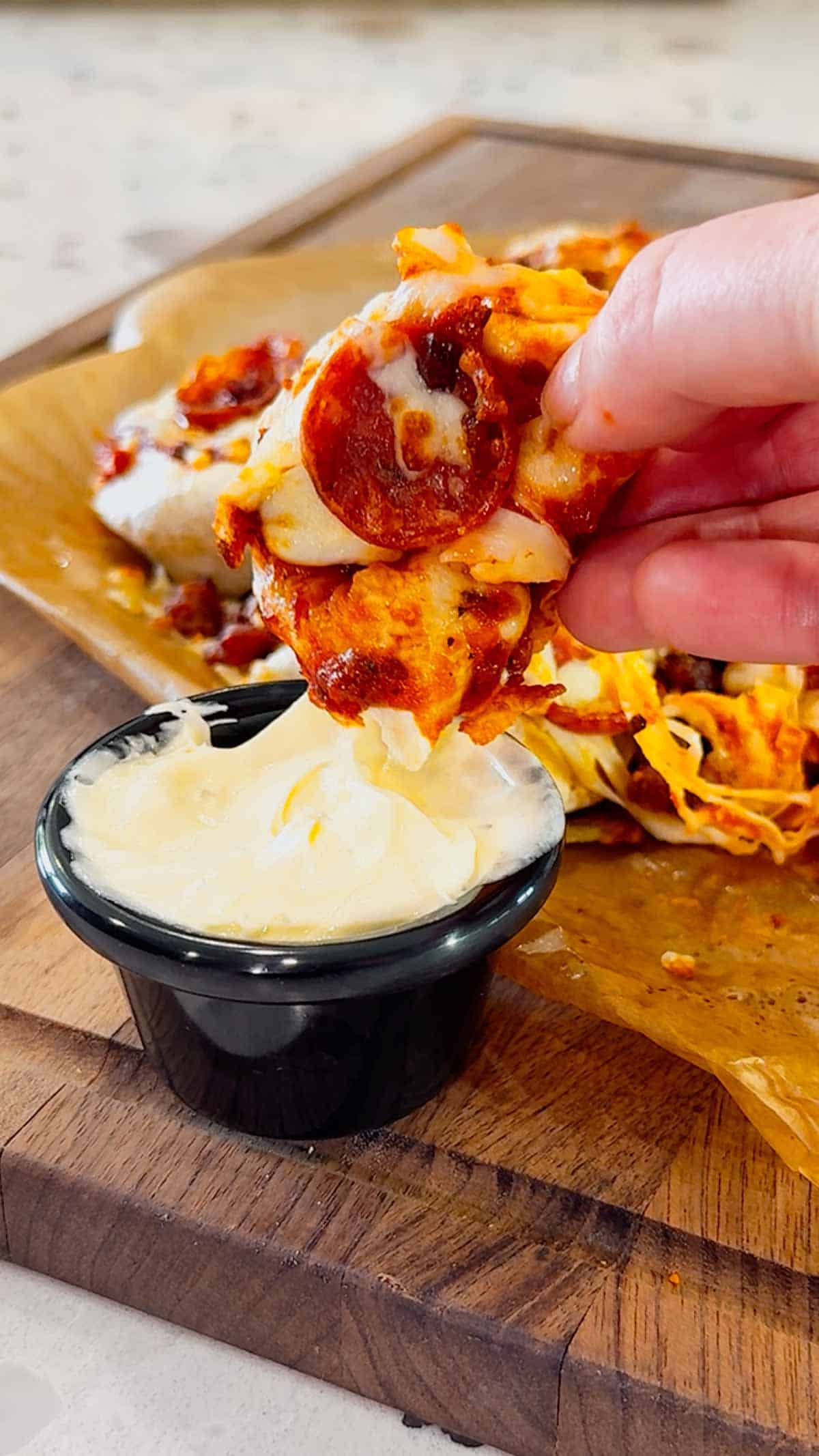 Air Fryer Pizza Pierogies are the ultimate easy comfort food recipe for busy weeknights, game day snacks, party appetizers and lazy dinners. Frozen bacon pierogies are air fried until crispy and golden, then topped with pizza sauce, shredded mozzarella cheese, pepperoni and crumbled bacon for a cheesy pizza-inspired dinner everyone will love. This easy air fryer recipe is perfect for picky eaters, quick meals, easy dinner ideas, air fryer snacks and fun family dinners. If you love pizza recipes, frozen pierogi recipes, cheesy appetizers, easy air fryer dinners, quick comfort food and crispy air fryer recipes, these loaded pizza pierogies are a must-try for your next weeknight meal, movie night snack or game day party food spread.