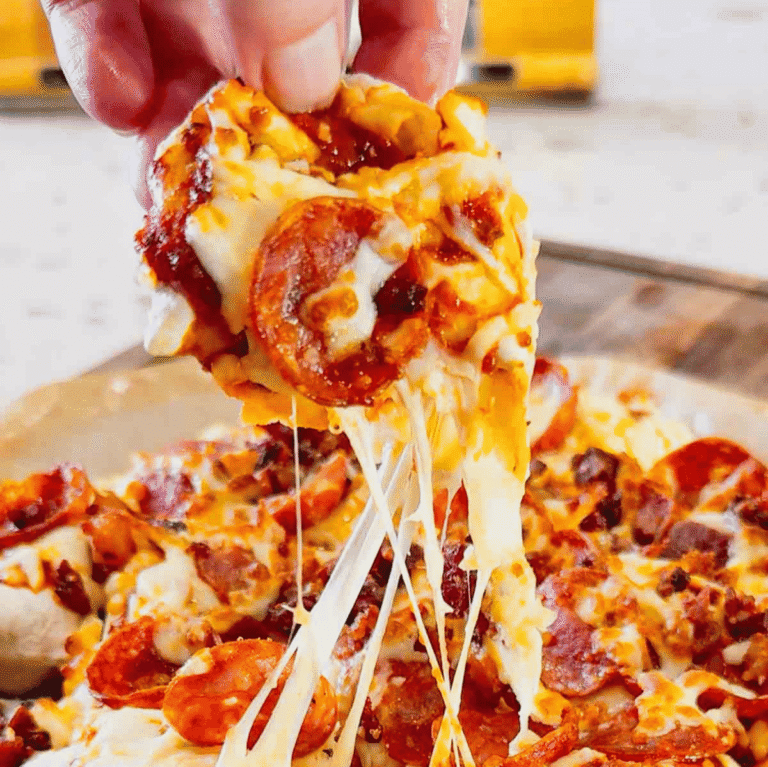 Air Fryer Pizza Pierogies are the ultimate easy comfort food recipe for busy weeknights, game day snacks, party appetizers and lazy dinners. Frozen bacon pierogies are air fried until crispy and golden, then topped with pizza sauce, shredded mozzarella cheese, pepperoni and crumbled bacon for a cheesy pizza-inspired dinner everyone will love. This easy air fryer recipe is perfect for picky eaters, quick meals, easy dinner ideas, air fryer snacks and fun family dinners. If you love pizza recipes, frozen pierogi recipes, cheesy appetizers, easy air fryer dinners, quick comfort food and crispy air fryer recipes, these loaded pizza pierogies are a must-try for your next weeknight meal, movie night snack or game day party food spread.
