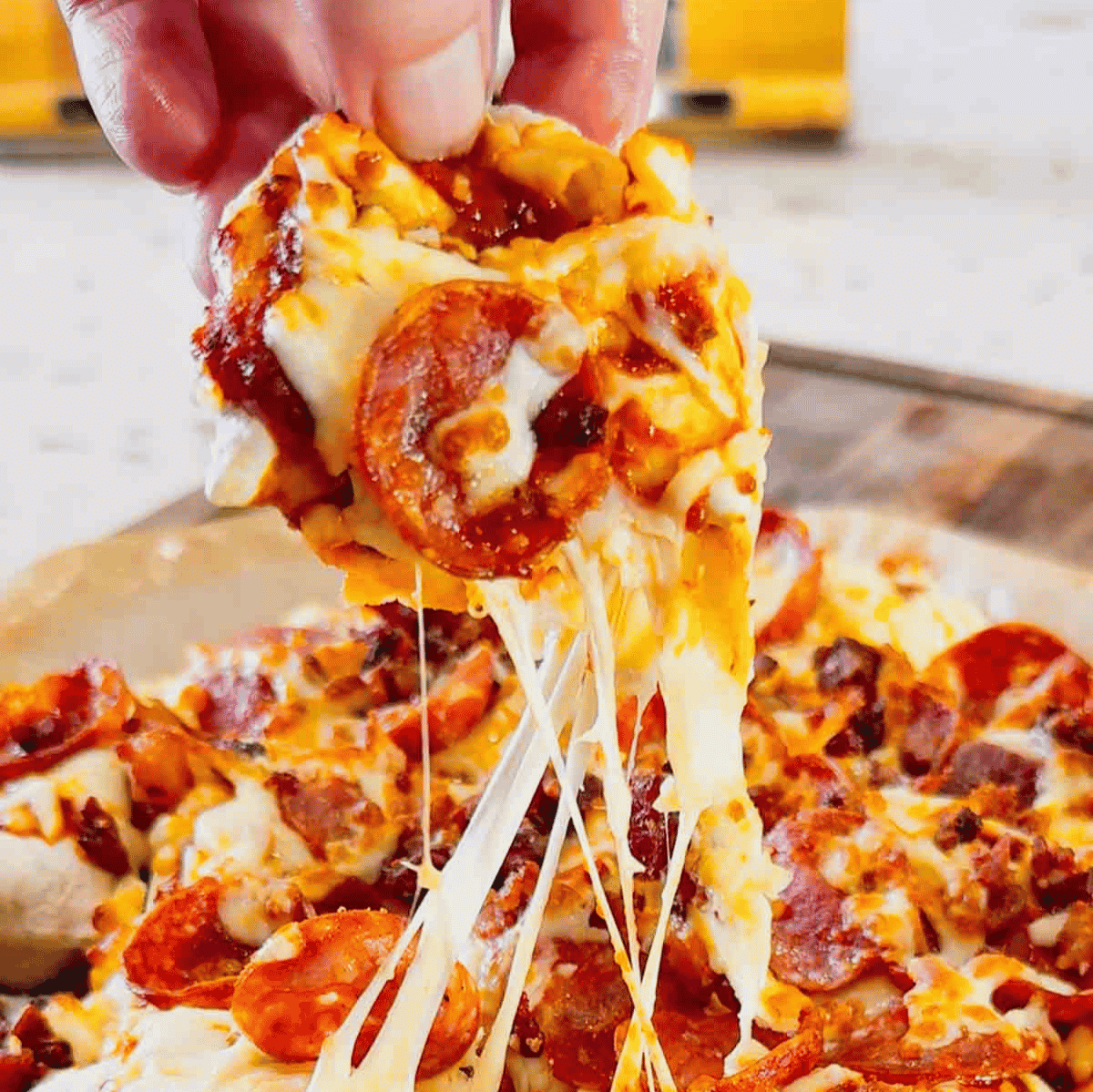 Air Fryer Pizza Pierogies are the ultimate easy comfort food recipe for busy weeknights, game day snacks, party appetizers and lazy dinners. Frozen bacon pierogies are air fried until crispy and golden, then topped with pizza sauce, shredded mozzarella cheese, pepperoni and crumbled bacon for a cheesy pizza-inspired dinner everyone will love. This easy air fryer recipe is perfect for picky eaters, quick meals, easy dinner ideas, air fryer snacks and fun family dinners. If you love pizza recipes, frozen pierogi recipes, cheesy appetizers, easy air fryer dinners, quick comfort food and crispy air fryer recipes, these loaded pizza pierogies are a must-try for your next weeknight meal, movie night snack or game day party food spread.