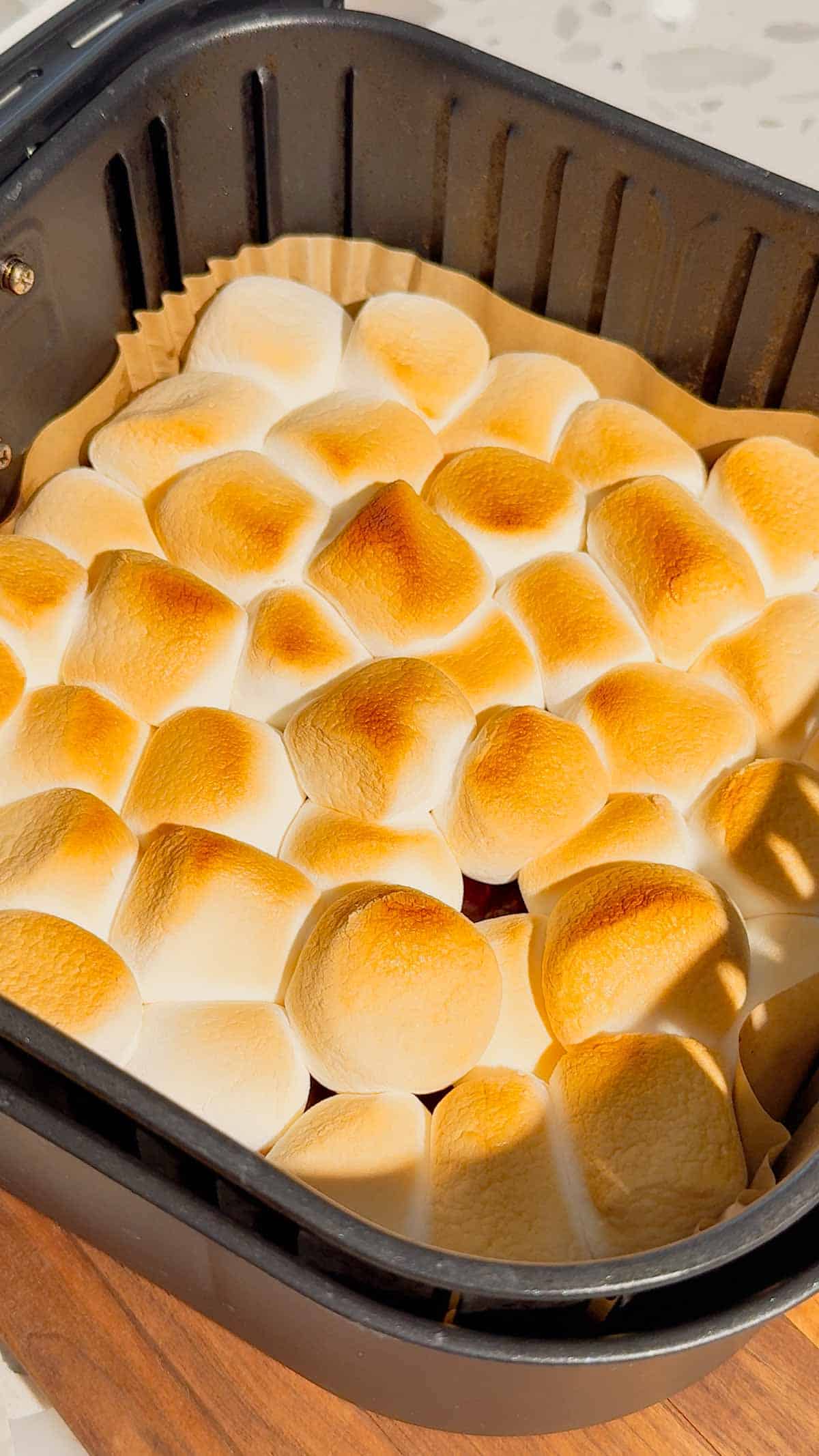 This Air Fryer Strawberry Nutella S’mores Dip is the ultimate easy dessert recipe for chocolate lovers, summer parties and cozy movie nights at home. Made with creamy Nutella, sweet strawberry pie filling and gooey toasted marshmallows, this air fryer dessert is a fun twist on classic campfire s’mores without needing a fire pit. Serve it warm with graham crackers, cookies, pretzels or fresh strawberries for the perfect sweet snack, party dessert or quick treat idea. If you love easy air fryer recipes, dessert dips, viral TikTok desserts, chocolate strawberry desserts, marshmallow treats and fun family dessert ideas, this easy s’mores dip recipe is a must try for sleepovers, date nights, birthday parties, holiday gatherings and summer entertaining.