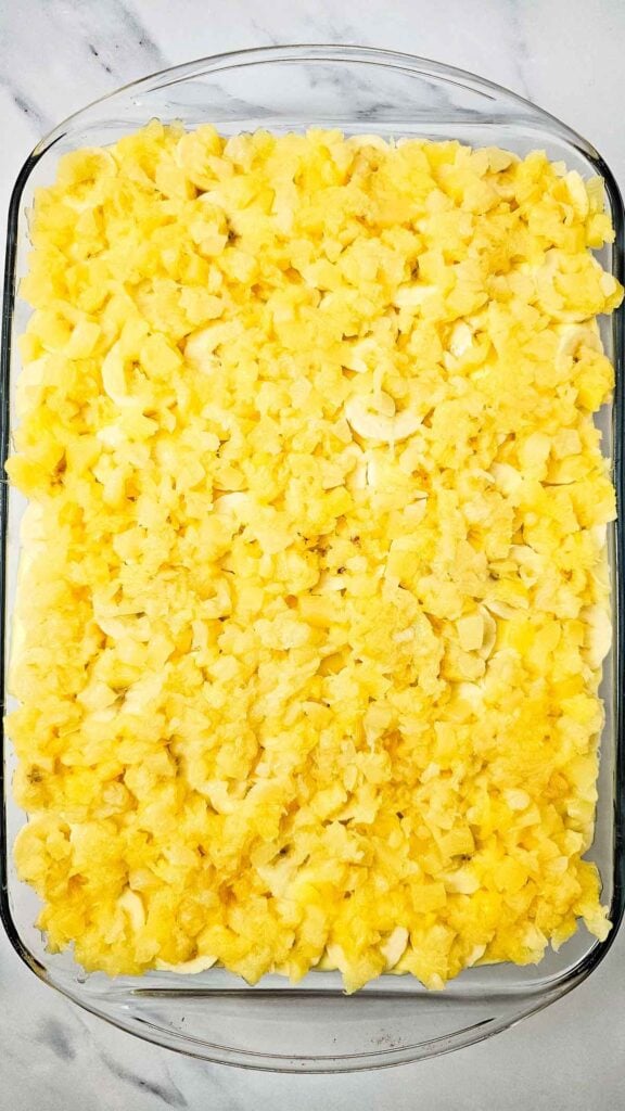 spread pineapple over the bananas