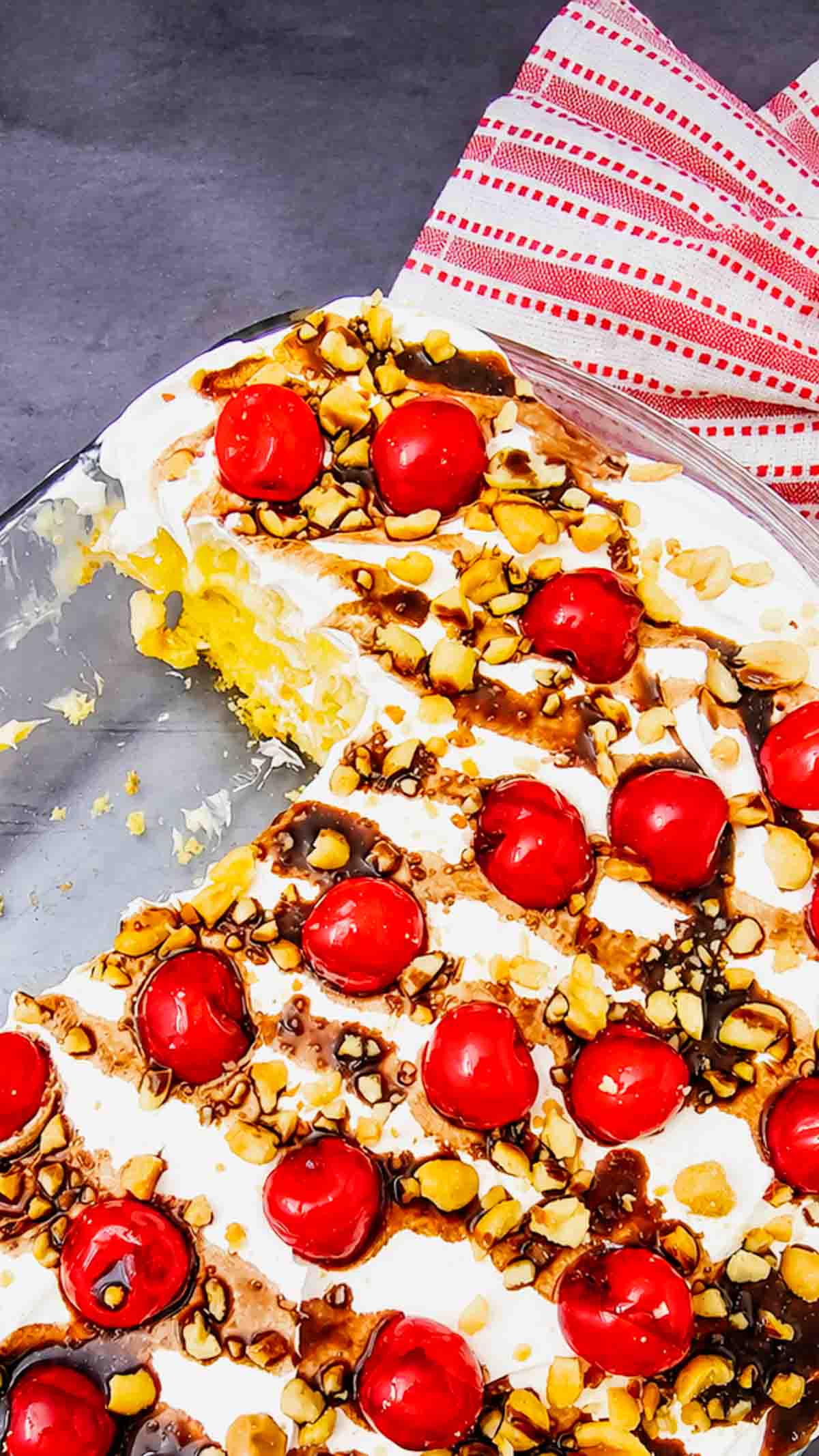 Banana Split Cake is the ultimate easy dessert recipe for anyone who loves classic banana split flavors in a soft baked cake. This layered dessert starts with a moist yellow cake base and is topped with bananas, crushed pineapple, fluffy whipped topping, chocolate drizzle, and maraschino cherries for the perfect sweet finish. If you’re searching for easy cake recipes, banana desserts, pineapple desserts, potluck desserts, summer desserts, or crowd pleasing party desserts, this Banana Split Cake recipe is a must-try. Great for birthdays, BBQs, family gatherings, holidays, and make ahead desserts, this colorful treat is simple to prepare and always a hit with both kids and adults who love fun retro dessert recipes.