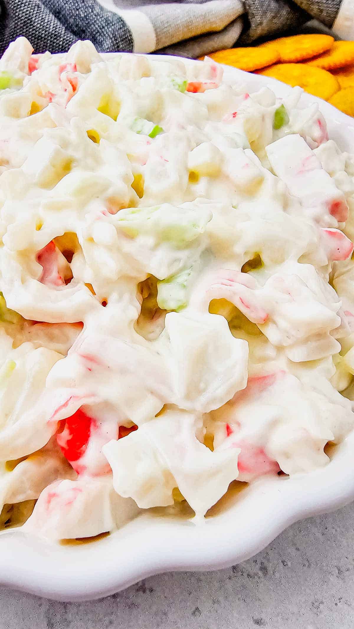 Cold Crab Salad is the easy chilled seafood recipe you’ll want to make all summer long. This creamy crab salad is loaded with imitation crab, crunchy celery, onions and a flavorful dressing for the perfect light lunch, party appetizer or quick dinner idea. Serve it with crackers, pile it onto sandwich rolls, stuff it into croissants or enjoy it straight from the bowl for an easy no cook meal. This cold crab salad recipe is perfect for potlucks, picnics, BBQs, beach lunches and meal prep because it comes together fast with simple ingredients. If you love easy seafood salad recipes, crab salad sandwiches, cold lunch ideas and refreshing summer recipes, this creamy imitation crab salad is guaranteed to become a family favorite.