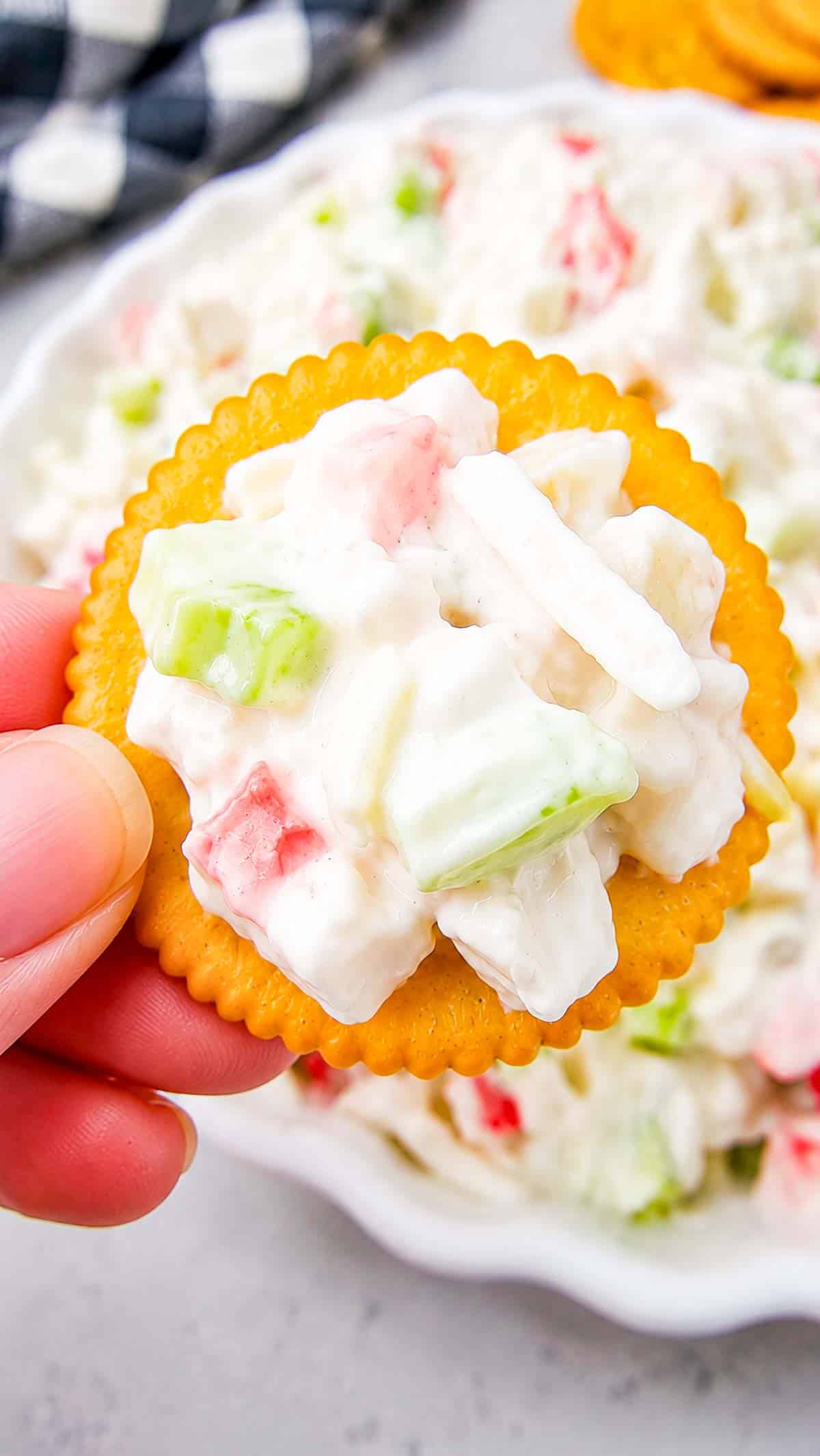 Cold Crab Salad is the easy chilled seafood recipe you’ll want to make all summer long. This creamy crab salad is loaded with imitation crab, crunchy celery, onions and a flavorful dressing for the perfect light lunch, party appetizer or quick dinner idea. Serve it with crackers, pile it onto sandwich rolls, stuff it into croissants or enjoy it straight from the bowl for an easy no cook meal. This cold crab salad recipe is perfect for potlucks, picnics, BBQs, beach lunches and meal prep because it comes together fast with simple ingredients. If you love easy seafood salad recipes, crab salad sandwiches, cold lunch ideas and refreshing summer recipes, this creamy imitation crab salad is guaranteed to become a family favorite.