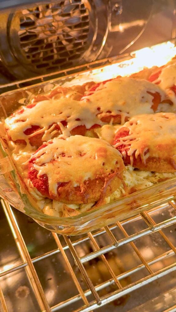 chicken parm tortellini alfredo baking in the oven