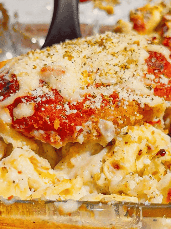 This Dump and Bake Chicken Parm Tortellini Alfredo is the ultimate easy comfort food dinner for busy weeknights, lazy dinners and family meals everyone will love. Made with refrigerated cheese and bacon tortellini, creamy jarred Alfredo sauce, crispy breaded chicken burgers, rich marinara sauce and gooey melted mozzarella, this baked pasta casserole comes together in one dish with almost no prep. If you love easy chicken parm recipes, dump dinners, baked tortellini recipes, cheesy pasta casseroles and simple family dinner ideas, this recipe is a must-try. Perfect for quick weeknight dinners, freezer meals, potlucks and cozy comfort food cravings, this creamy chicken parmesan tortellini bake is loaded with flavour, cheesy layers and hearty pasta goodness in every bite.