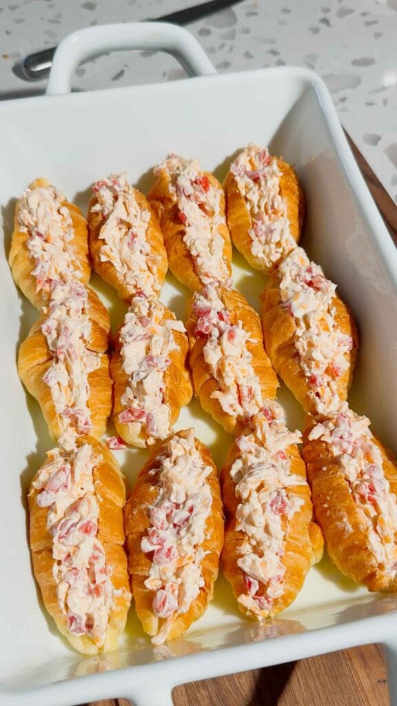 pimenot cheese stuffed mini croissants in a baking dish