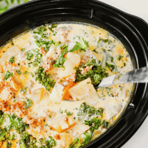 This Crockpot Zuppa Toscana is the ultimate comfort soup recipe loaded with Italian sausage, potatoes, bacon, kale and a rich creamy broth. If you love Copycat Olive Garden Zuppa Toscana, this Slow Cooker Zuppa Toscana is an easy family dinner that tastes even better than the restaurant version. Learn How To Make Olive Garden Zuppa Toscana at home with simple ingredients and minimal prep. This Zuppa Toscana Soup Recipe is perfect for busy weeknights, cozy weekends and feeding a crowd. Whether you're searching for Easy Soup Recipes, Italian Soup Recipes, Sausage And Kale Soup, Kale Soup Recipes, Homemade Soup Recipe ideas or a delicious Crockpot Zuppa Toscana, this hearty Toscana Soup delivers big flavor in every bite. Save this Easy Zuppa Toscana Soup for your next Soup Dinner night!