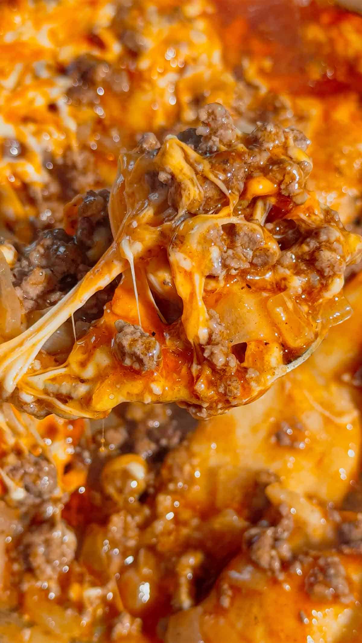 If you're looking for an easy comfort food dinner that combines Mexican-inspired flavors with hearty family-friendly ingredients, this Beef Enchilada Pierogies recipe is a must-try. Frozen pierogies are layered in a baking dish, topped with seasoned ground beef, rich red enchilada sauce, and plenty of melted cheddar cheese for a simple weeknight meal everyone will love. This easy casserole recipe is perfect for busy nights, potlucks, meal prep, and budget-friendly dinners. Whether you're searching for Ground Beef Dinner Recipes, Easy Casserole Recipes, Enchilada Casserole Ideas, Pierogi Casserole Recipes, Frozen Pierogies Recipes, or Cheesy Beef Bakes, this recipe delivers big flavor with minimal effort. The combination of tender potato-filled pierogies, savory beef, zesty enchilada sauce, and gooey cheese creates the ultimate comfort food casserole. Save this Easy Beef Enchilada Pierogies Bake for quick family dinners, freezer meals, cozy weeknight suppers, and crowd-pleasing comfort food recipes that are guaranteed to disappear fast.