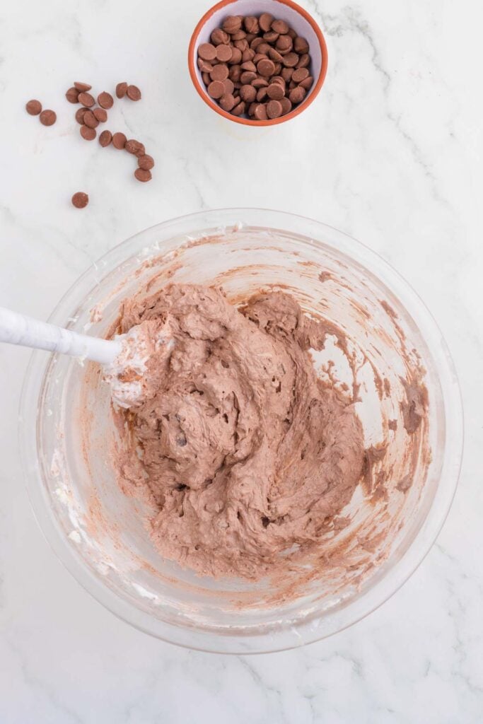 brownie mix, cream cheese and cool whip stirred together in a mixing bowl