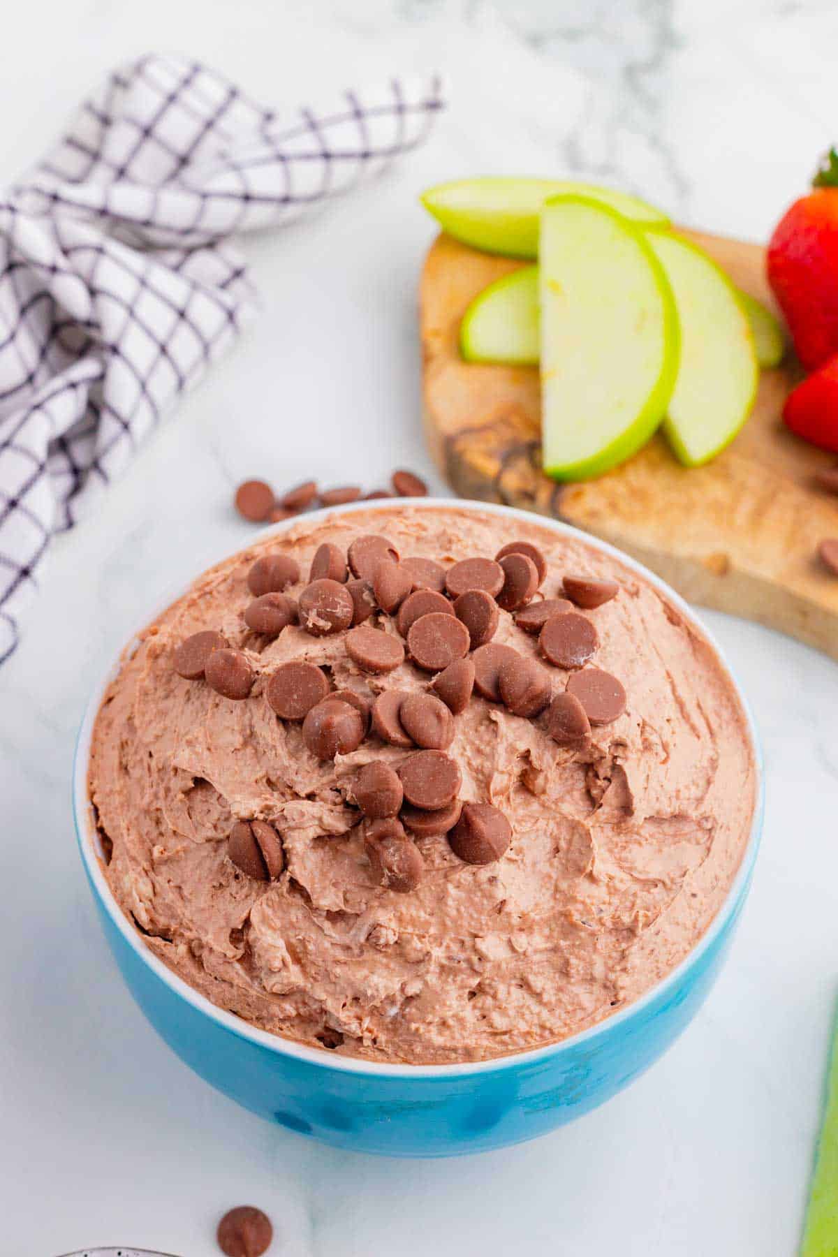 Craving chocolate but don’t feel like baking? This Brownie Batter Dip is the ultimate no-bake dessert that comes together in just 5 minutes with cream cheese, Cool Whip, brownie mix, and mini chocolate chips. Rich, creamy, and packed with classic brownie batter flavor, this easy dessert dip is perfect for parties, game day spreads, movie nights, holiday gatherings, and last-minute sweet cravings. Serve it with graham crackers, vanilla wafers, pretzels, strawberries, apple slices, or cookies for an irresistible treat everyone will love. If you're looking for easy dessert recipes, chocolate dip recipes, no bake desserts, brownie batter desserts, party food ideas, and quick sweet treats, this crowd-pleasing dip is guaranteed to disappear fast. Save this simple brownie batter dip recipe for your next celebration!