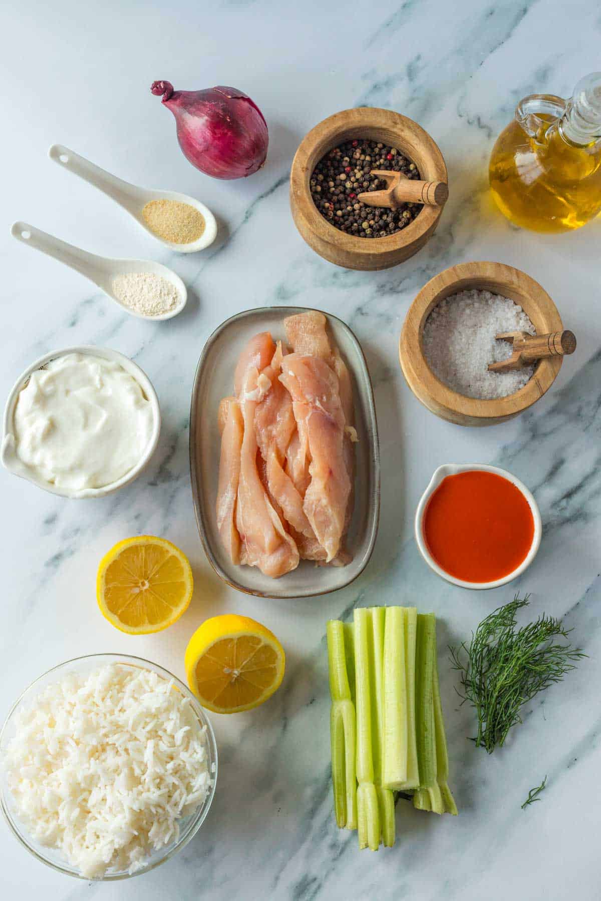 buffalo chicken bowl ingredients on the kitchen counter